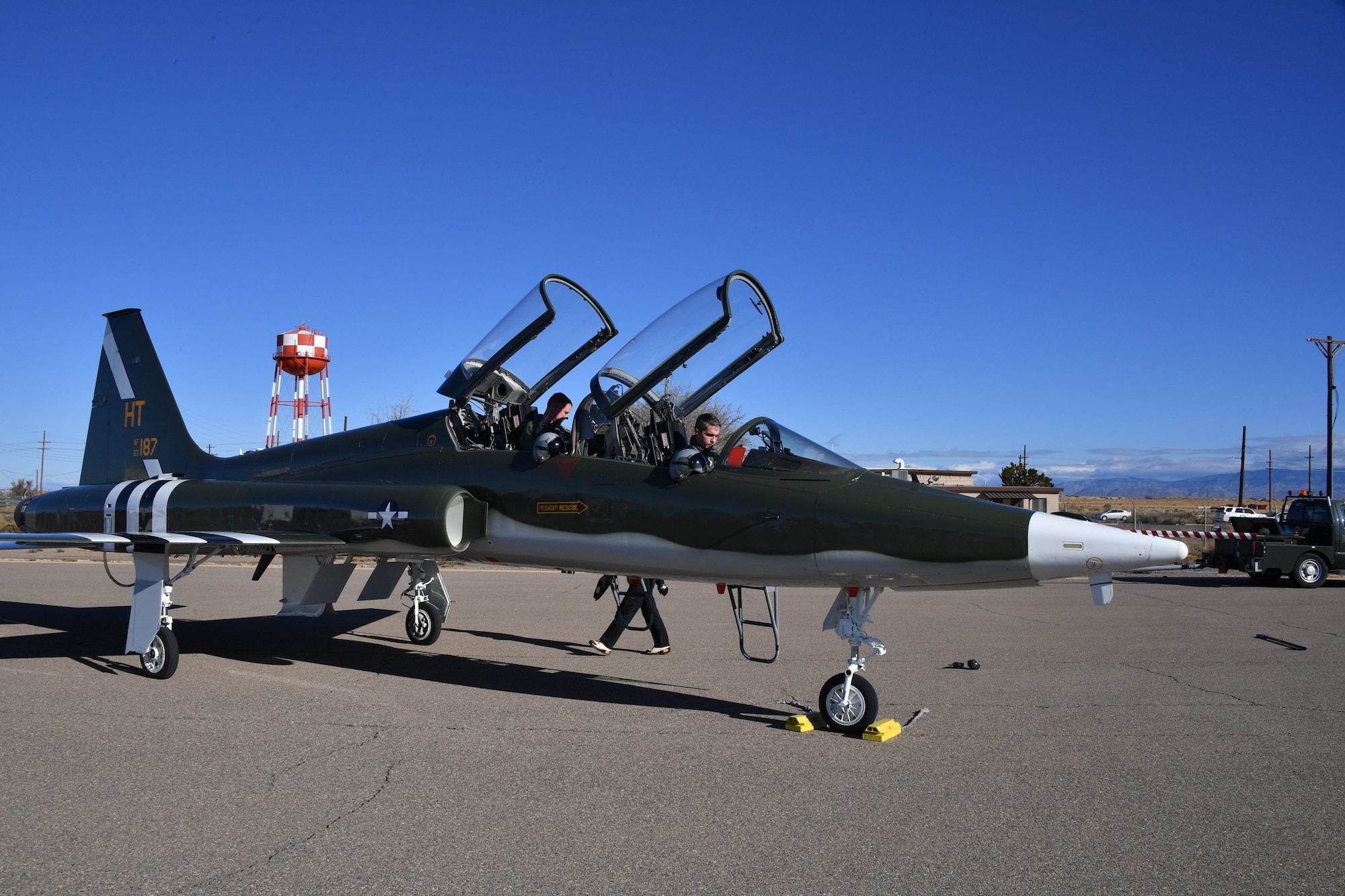 A T-38 Talon crew, Maj. Scott Pontzer, front cockpit, and Capt. Trevor Breau, from the 586th Flight Test Squadron, 704th Test Group, Arnold Engineering Development Complex, prepare for a test flight with Kubernetes software onboard, Dec. 11, 2020. (U.S. Air Force photo)