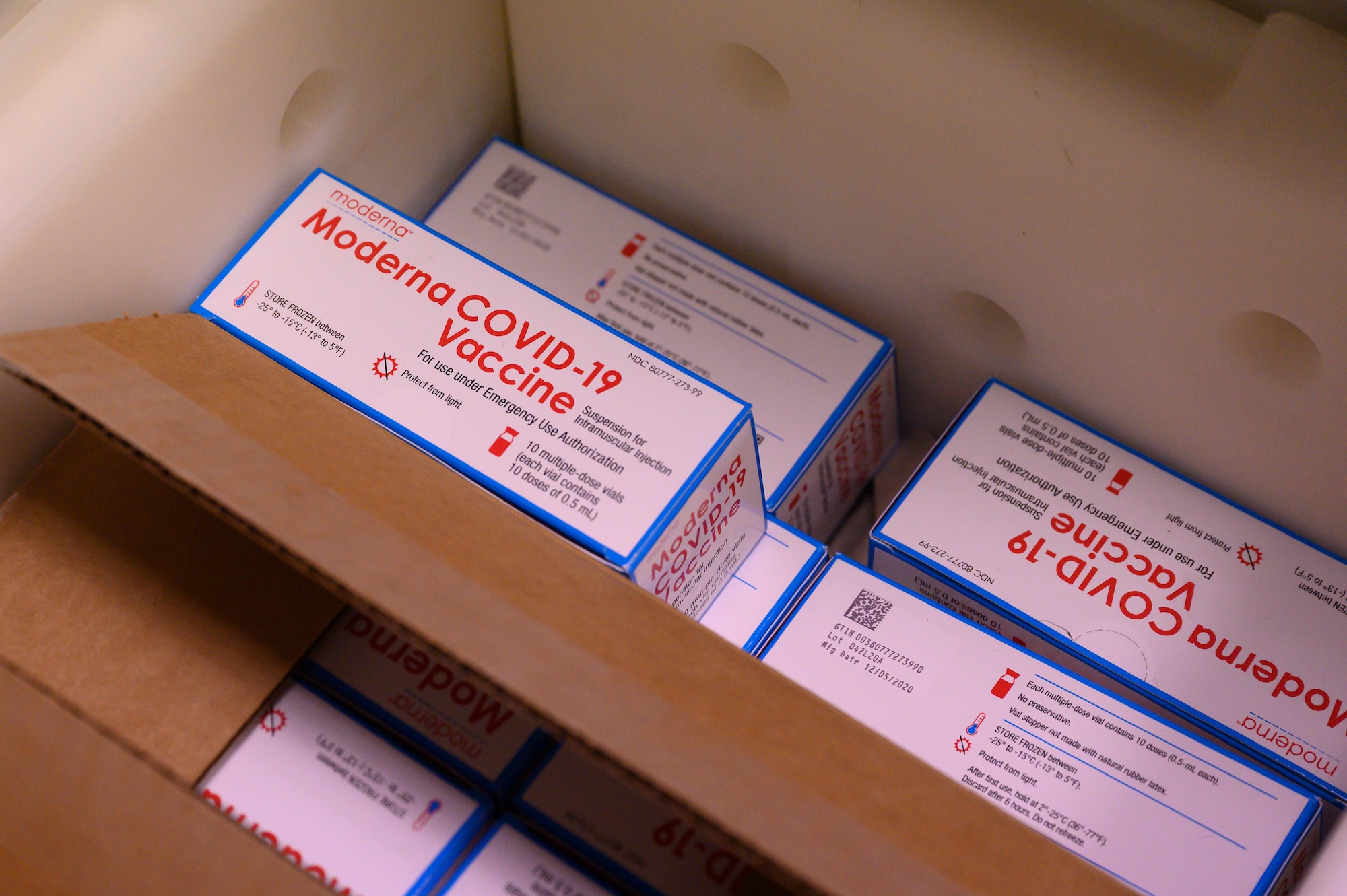 A photo of COVID-19 vaccines sitting in a box.