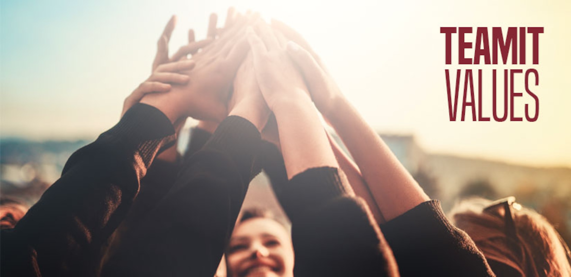 Group of hands meeting together.