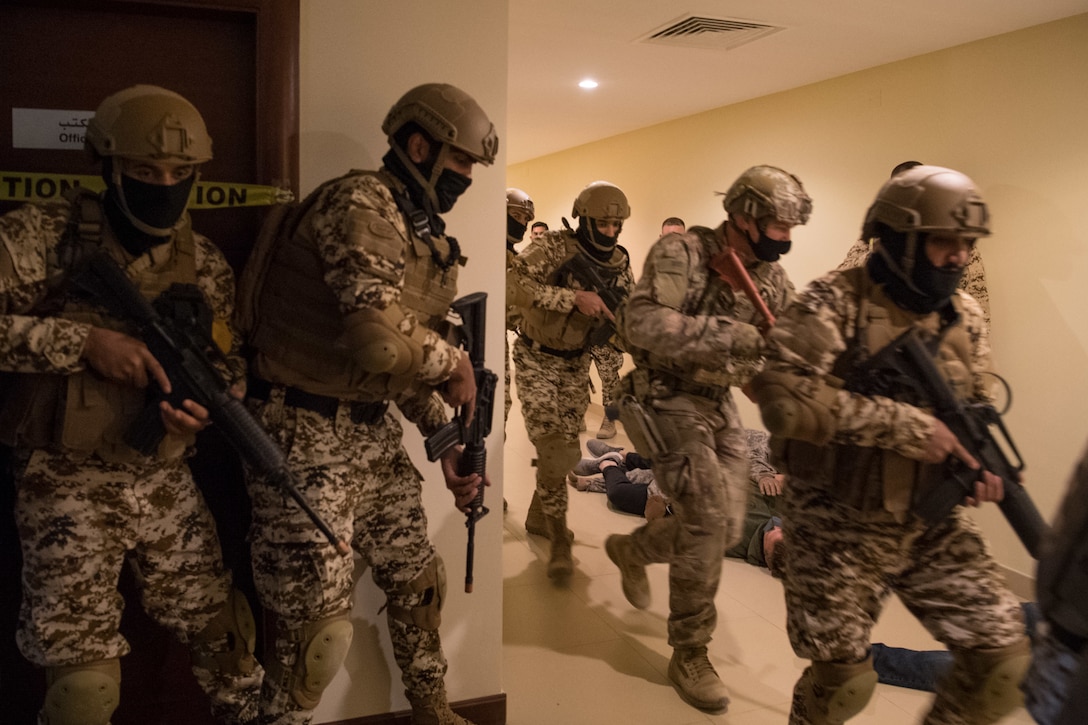 5TH FLEET AREA OF OPERATIONS (Jan. 13, 2021) Bahrain Defense Force and U.S. Naval Forces Central Command personnel simulate clearing a building during a joint anti-terrorism exercise in the U.S. 5th Fleet Area of Operations, Jan. 13. The bilateral exercise focused on enhancing mutual security and anti-terrorism capabilities by testing responses to simulated scenarios. (U.S. Navy photo by Mass Communication Specialist 2nd Class Matthew Riggs)