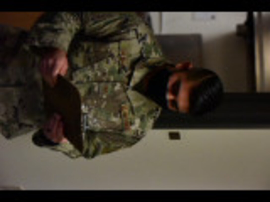 Staff Sgt. Juan Salinas, 341st Security Forces Squadron military working dog trainer, takes notes during the drug detection evaluation, Jan. 14, 2021 at the Chapel on Malmstrom AFB, Mont.