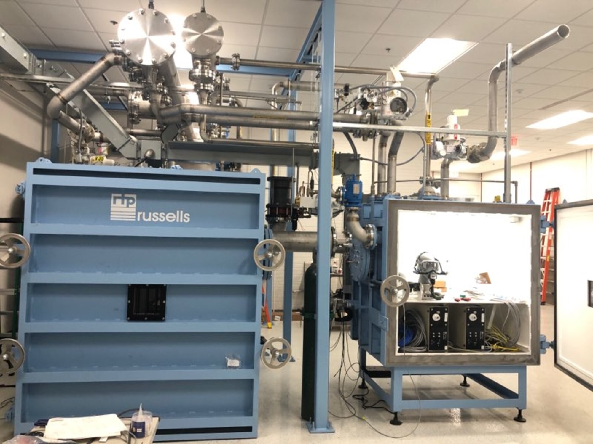 The Air Force Research Laboratory and the Air Force Life Cycle Management Center partnered to create the Life Support Systems Scientific Test, Analysis, and Qualification Laboratory for the investigation of mission-critical in-flight oxygen issues. Pictured here is the facility’s cabin chamber, used for the December 2020 testing of a quick don oxygen mask. (U.S. Air Force photo)