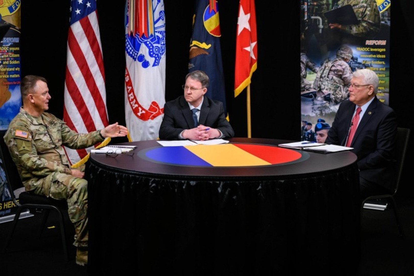 Gen. Paul E. Funk II, commanding general, U.S. Army Training and Doctrine Command (left), hosted retired Army Gen. Carter F. Ham, president and chief executive officer, Association of the United States Army (right), during a virtual leader professional development webinar, which was moderated by James Hoeft, TRADOC command information chief, that took place at Joint Base Langley-Eustic, Virginia, Jan. 13, 2021.