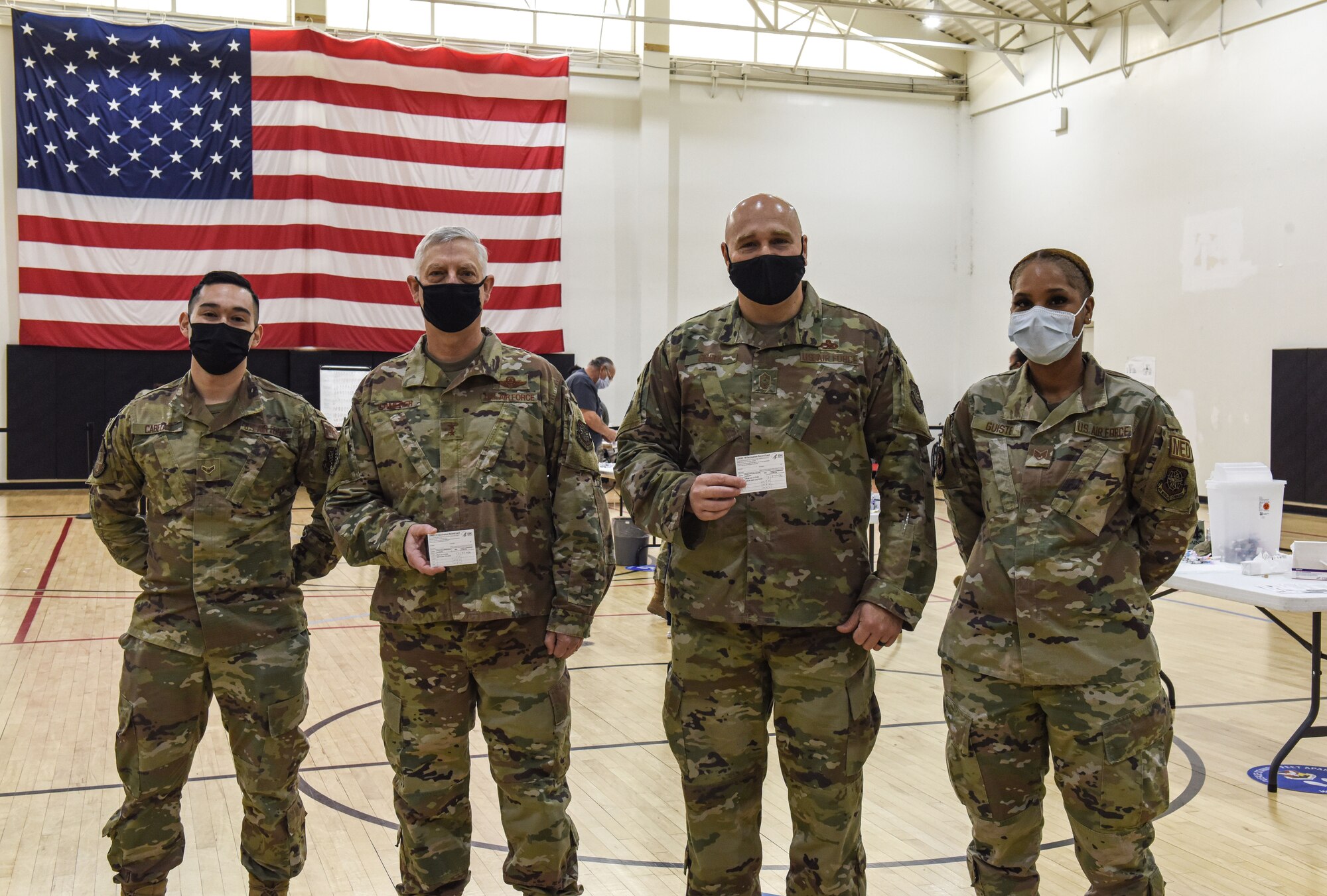 U.S. Air Force Maj. Gen. Mark Camerer, USAF Expeditionary Center commander, and USAF Expeditionary Command Chief, Chief Master Sgt. Anthony W. Green, after receiving the COVID-19 vaccine at Joint Base McGuire-Dix-Lakehurst, N.J. on January 13, 2021. The Joint Base received its first batch of vaccines December 31, 2020 and has been administering it since. (U.S. Air Force photo by Senior Airman Shay Stuart)