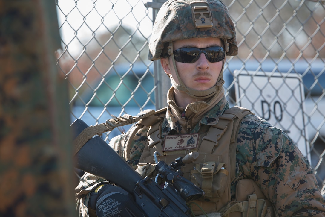 U.S. Marine Corps Sgt. Braxton Bosehart, a military police officer with Charlie FAST Company, 5th Platoon, Marine Corps Security Forces, U.S. Marine Corps Forces Command, Fleet Marine Force Atlantic, stands guard during a Mission Readiness Exercise (MRX) Jan 13, 2021, on Fort A. P. Hill in Port Royal, Virginia. Fleet Antiterrorism Security Team (FAST) platoons execute MRX exercises prior to deployment to evaluate the platoons’ proficiency in core mission essential tasks. (U.S. Marine Corps Photo by Sgt. Desmond Martin/Released)