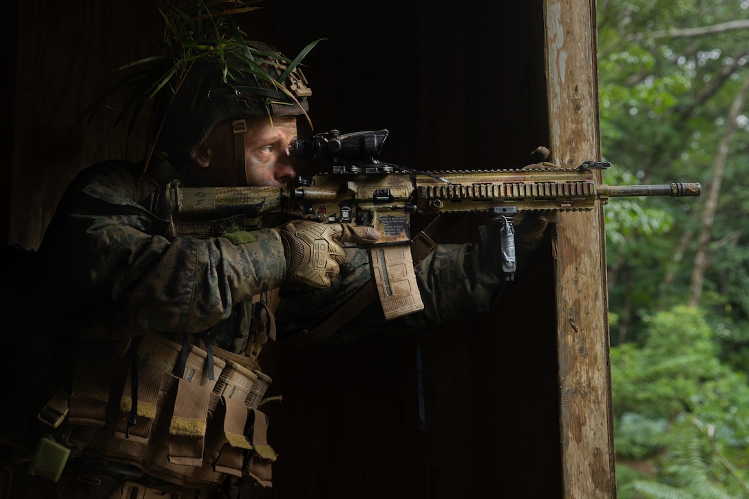 A U.S. Marine provides security during the 3rd Marine Division Rifle Squad Competition at Camp Gonsalves, Okinawa, Japan, Jan. 12.