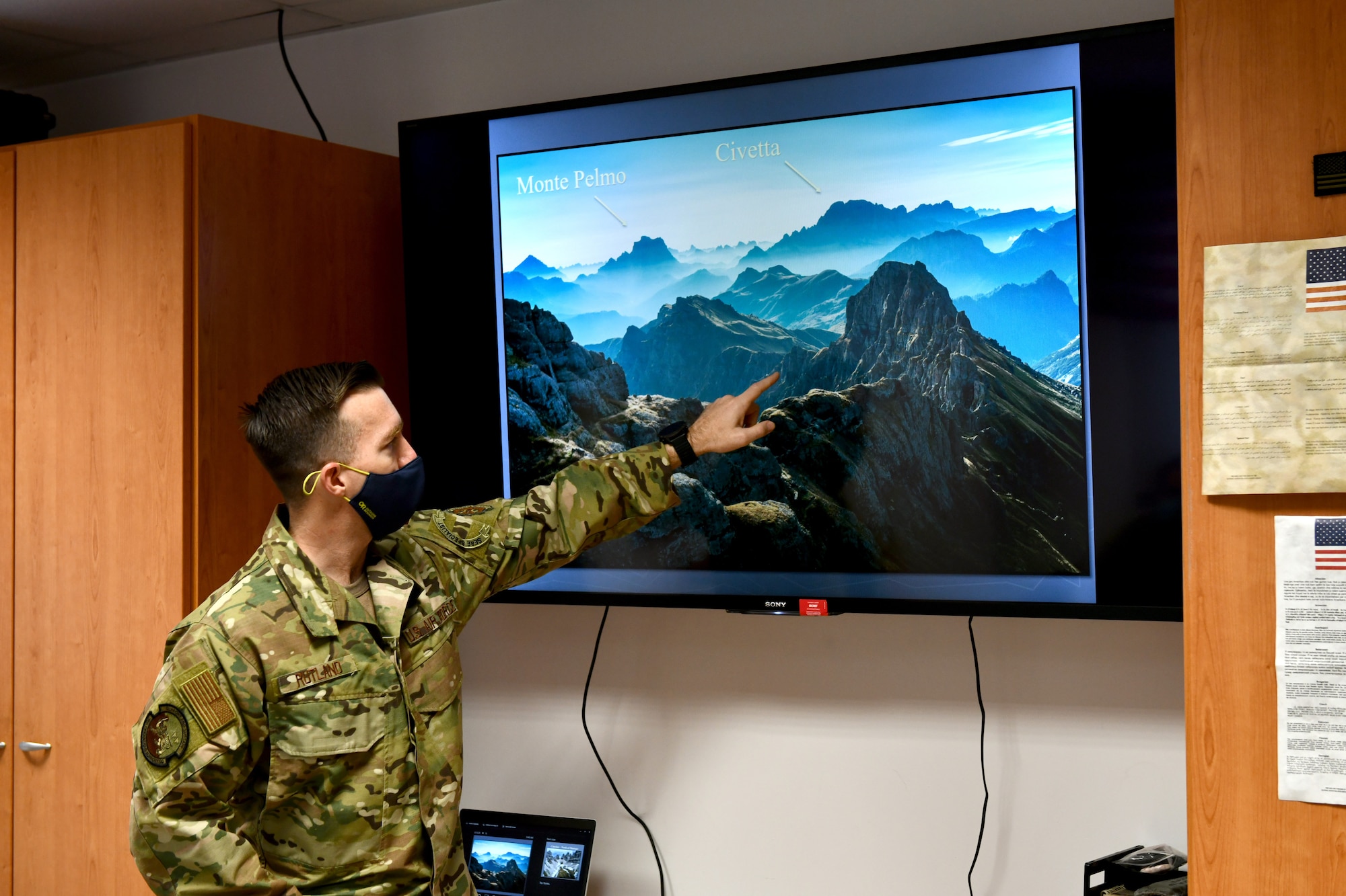 U.S. Air Force Tech. Sgt. Michael Rutland, 31st Operations Support Squadron Survival, Evasion, Resistance and Escape (SERE) noncommissioned officer in charge, explains the purpose of the “via ferrata” during SERE training at Aviano Air Base, Italy, Jan. 19, 2021. Italian for “iron path”, via ferrata is a system of metal cables or ladders that assist in climbing dangerous routes within the mountains. (U.S. Air Force photo by Staff Sgt. K. Tucker Owen)