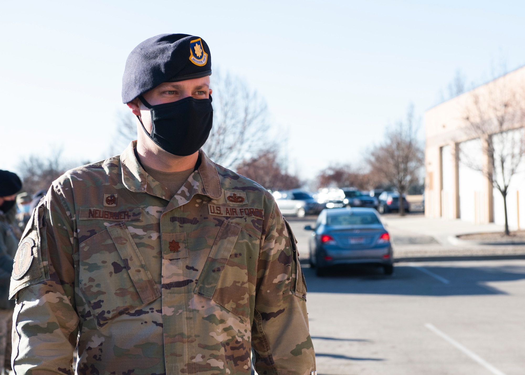 U.S. Air Force Maj. Andrew Neubauer, 366th Security Forces Squadron commander, enters Heritage Hall, at the 366th Medical Treatment Facility, Jan. 19, 2021. Neubauer was the first person to receive the first dose of the COVID-19 vaccine at MHAFB. (U.S. Air Force photo by Airman 1st Class Natalie Rubenak)