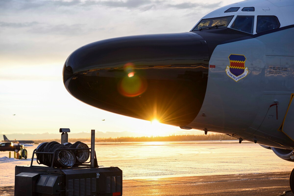 Two F-35A Lightning II's take off behind an RC-135S Cobra Ball static display Dec. 18, 2020, on Eielson Air Force Base, Alaska. (U.S. Air Force photo by Senior Airman Keith Holcomb)