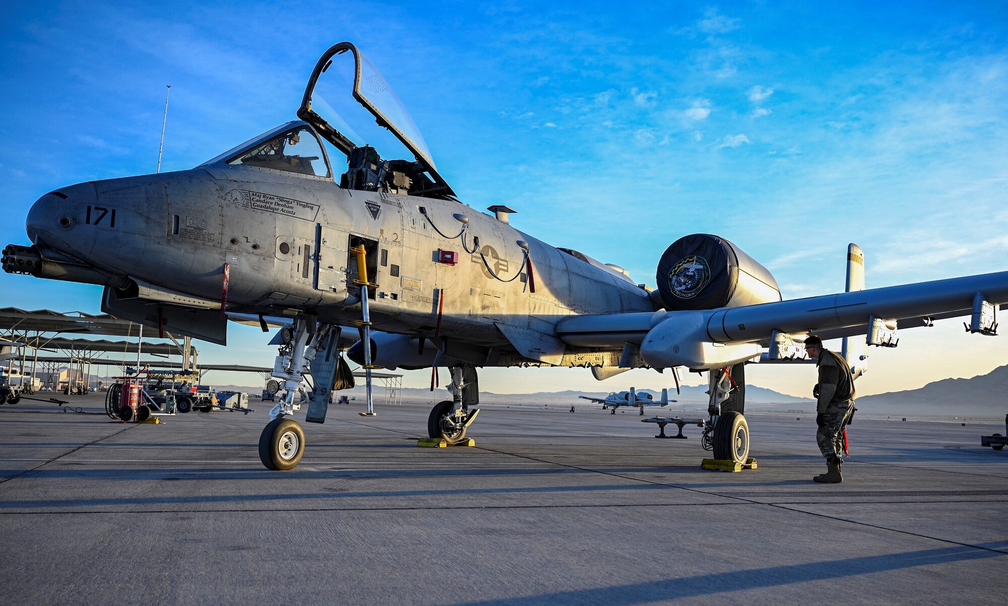 An A-10 sits on the flightline.