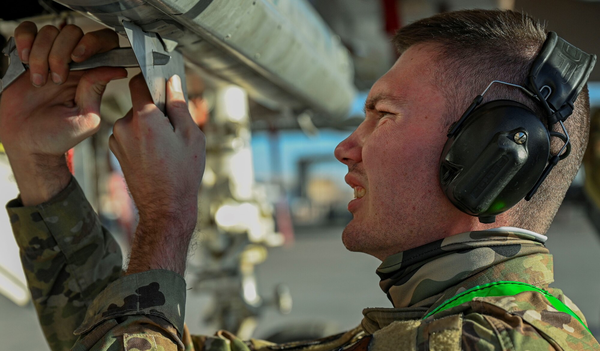 Airman works on munition