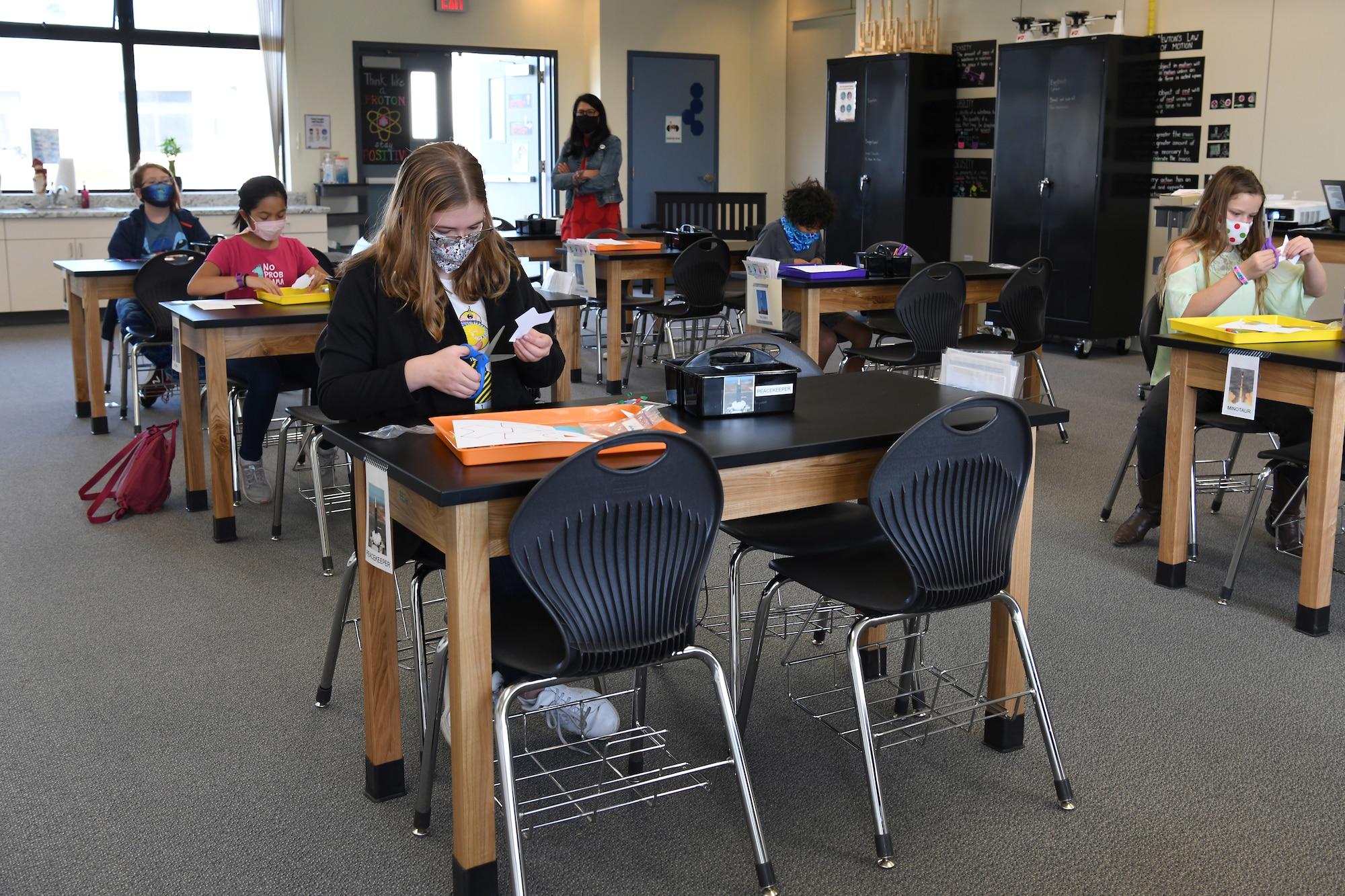 Students cut paper to create antibodies during the Disease Ecology and Viruses STARBASE Vandenberg class Jan. 13, 2021, at Vandenberg Air Force Base, Calif.