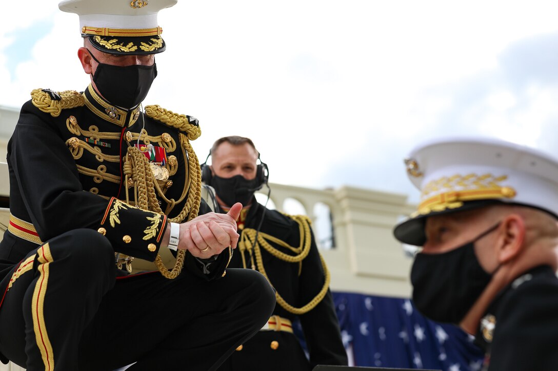 Marine Band Director Col. Jason K. Fettig speaks with Commandant of the Marine Corps, Gen. David H. Berger, prior to President Joe Biden's Inaugural Ceremony.

(U.S. Marine Corps photo by Staff Sgt. Chase Baran/released)