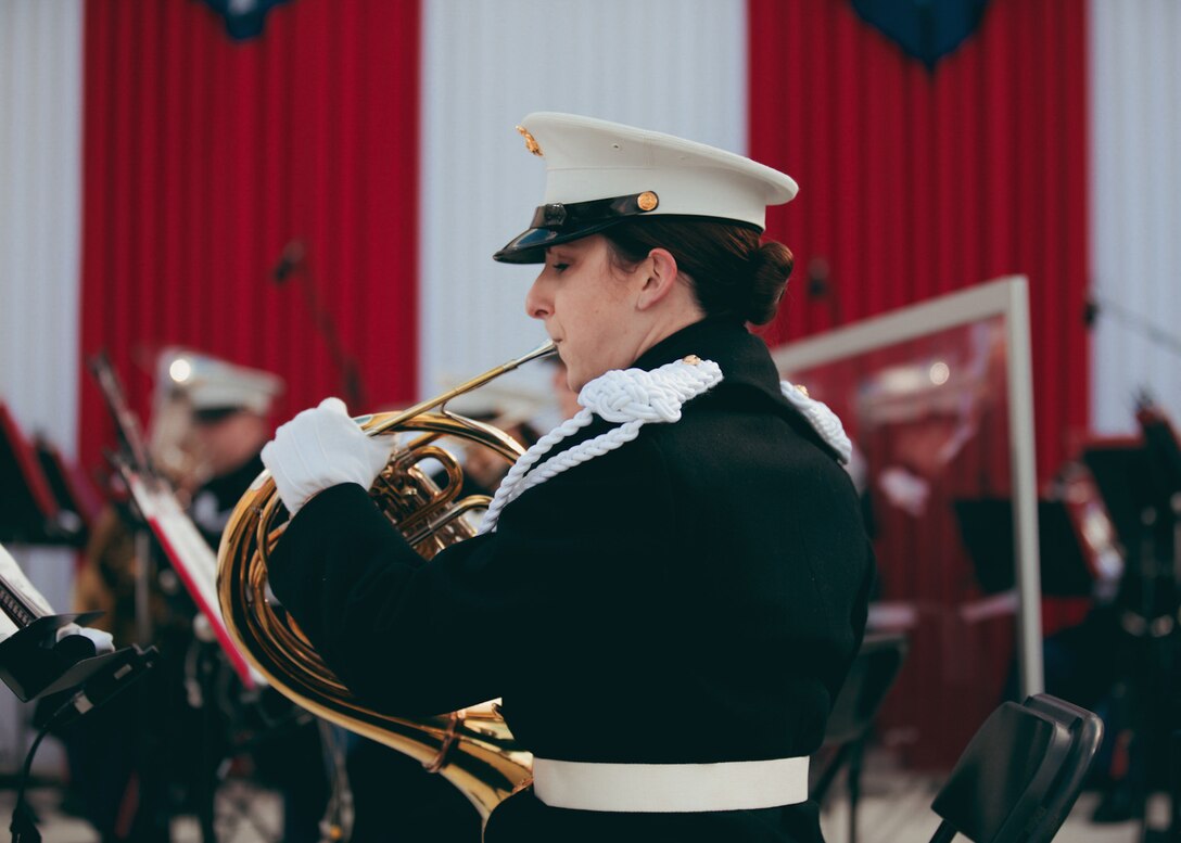 Staff Sgt. Becky McLaughlin, French horn player for "The President's Own" United States Marine Band, performs during the 2021 Inaugural Ceremony for President Joe Biden.