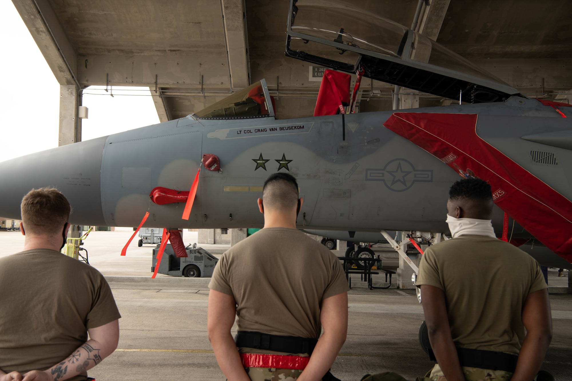The team representing the 67th Aircraft Maintenance Unit, prepares for the quarterly load competition at Kadena Air Base, Japan, Jan. 15, 2021. The 67th AMU won the quarterly load competition against the 44th AMU. (U.S. Air Force photo by Airman First Class Stephen Pulter)