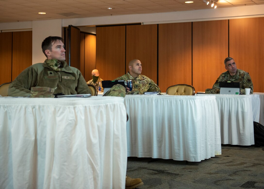 12th Air Force (Air Forces Southern) section chiefs listen to a discussion at the virtual Air Force Section Chief Theater Security Cooperation Workshop at Davis Monthan Air Force Base, Jan. 12, 2021. The AFSEC workshop brings together the Security Cooperation Office and Air Force section chiefs from U.S. Embassies throughout the U.S. Southern Command area of operations to discuss theater cooperation strategy with key enablers and stakeholders in the security cooperation enterprise.