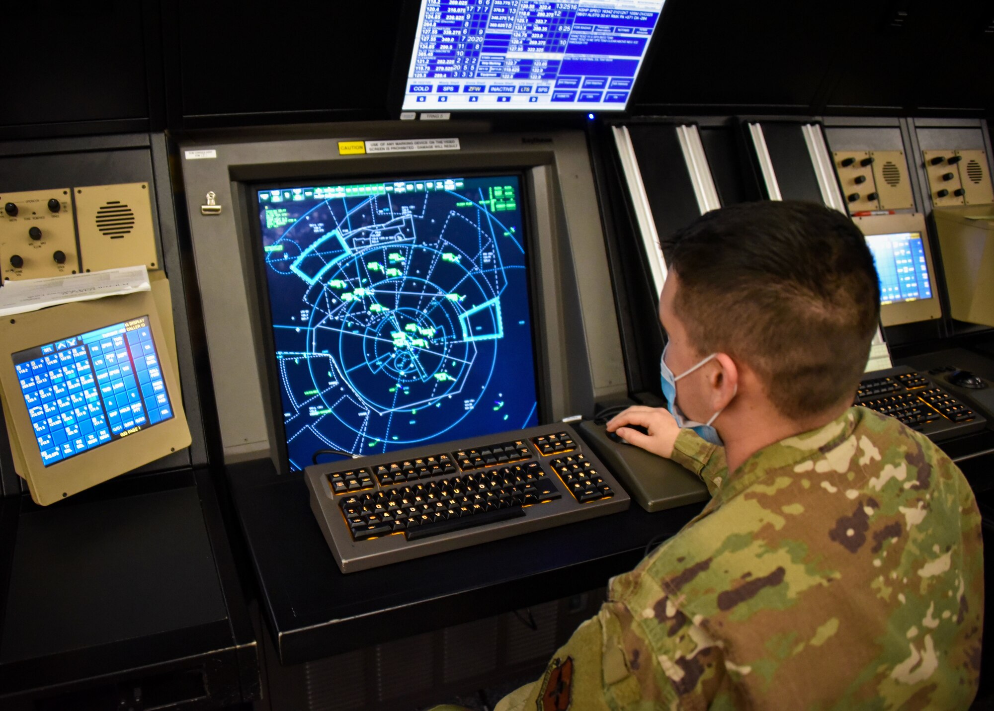 Staff Sgt. Robert Moreno monitors the airspace in North Texas and Southern Oklahoma