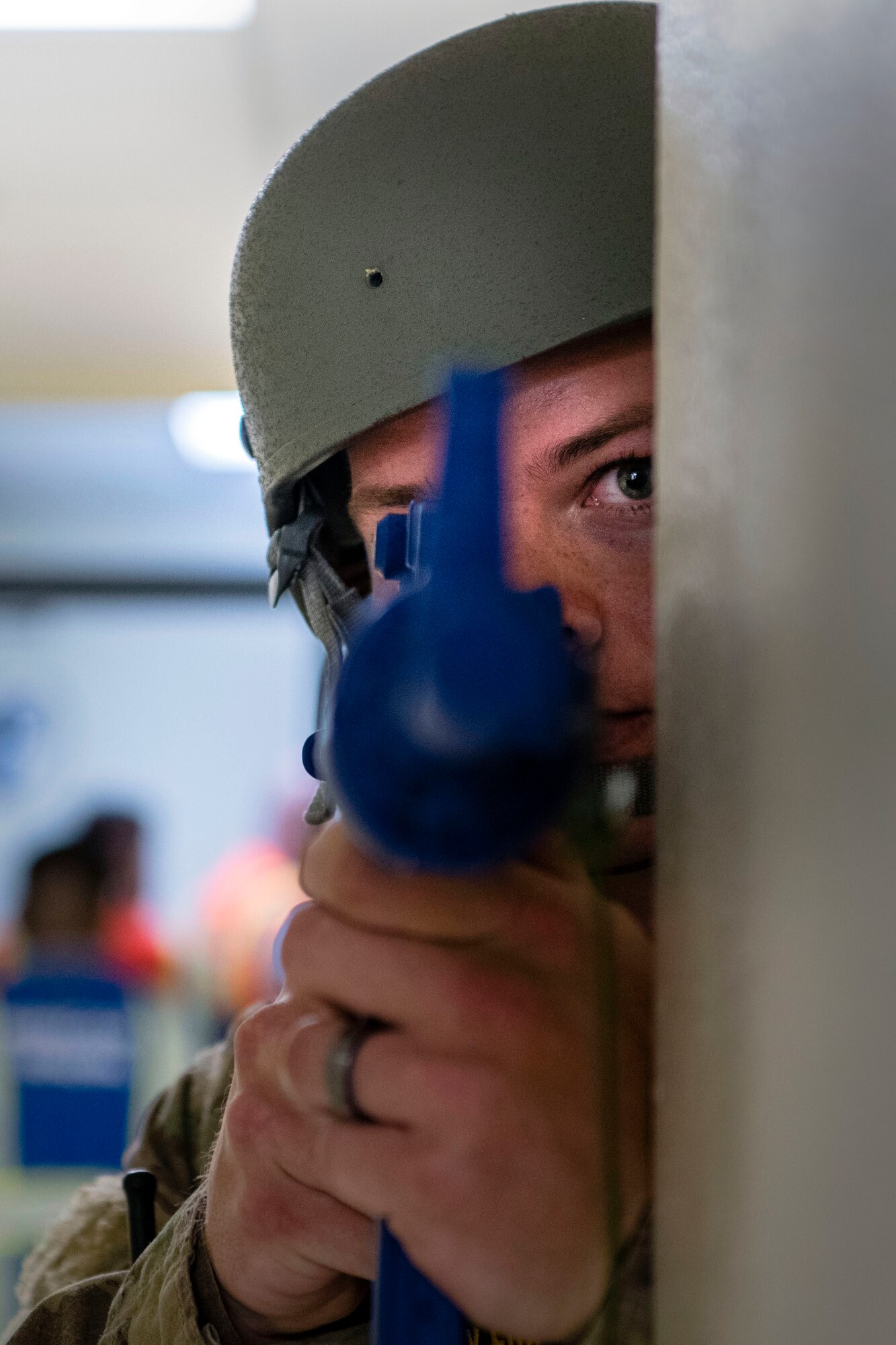 Senior Airman Gaige Bullard, 902nd Security Forces Squadron, scans a hallway during an active shooter exercise on Aug 28, 2019, at Joint Base San Antonio-Randolph.