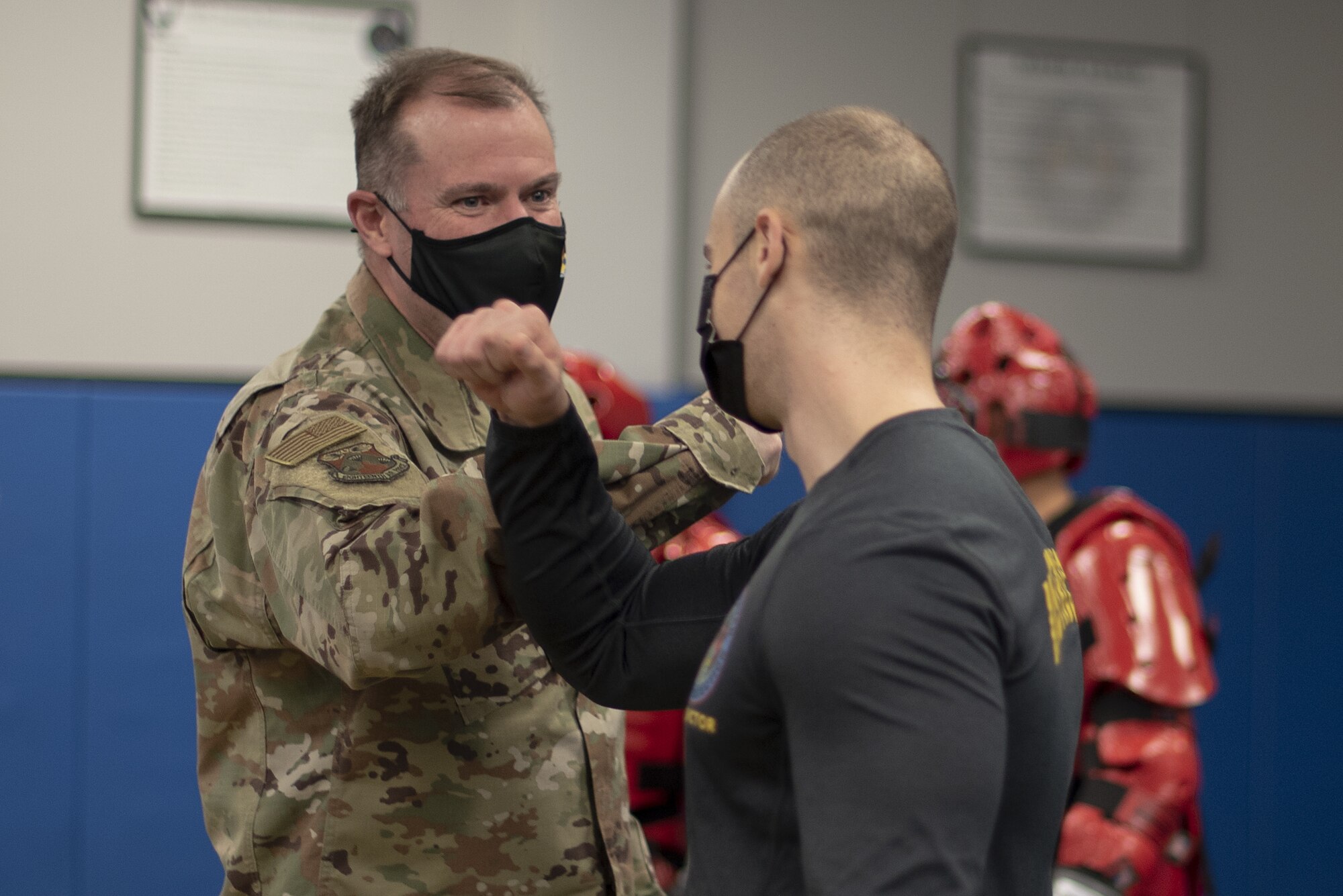 photo of Maj. Gen. Thad Bibb greeting Staff Sgt. Tanner Hall