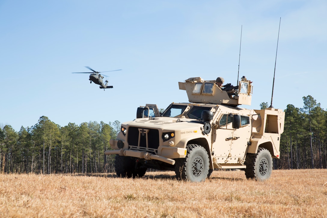 U.S. Marines with Charlie FAST Company, 5th Platoon, Marine Corps Security Forces, U.S. Marine Corps Forces Command, Fleet Marine Force Atlantic, utilizes the Joint Light Tactical Vehicle (JLTV) to provide security at a landing zone during a Mission Readiness Exercise (MRX) Jan 14, 2021, on Fort A. P. Hill in Port Royal, Virginia. Fleet Antiterrorism Security Team (FAST) platoons execute MRX exercises prior to deployment to evaluate the platoons’ proficiency in core mission essential tasks. (U.S. Marine Corps Photo by Sgt. Desmond Martin/Released)