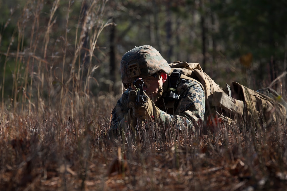 U.S. Marine Corps Lance Cpl. Austin Justice, a military police officer with Charlie FAST Company, 5th Platoon, Marine Corps Security Forces, U.S. Marine Corps Forces Command, Fleet Marine Force Atlantic, provides security at a landing zone during a Mission Readiness Exercise (MRX) Jan 14, 2021, on Fort A. P. Hill in Port Royal, Virginia. Fleet Antiterrorism Security Team (FAST) platoons execute MRX exercises prior to deployment to evaluate the platoons’ proficiency in core mission essential tasks. (U.S. Marine Corps Photo by Sgt. Desmond Martin/Released)