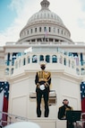 Col. Jason K. Fettig, Director of the United States Marine Band, stands at the podium before the start of the 2021 Inaugural Ceremony.