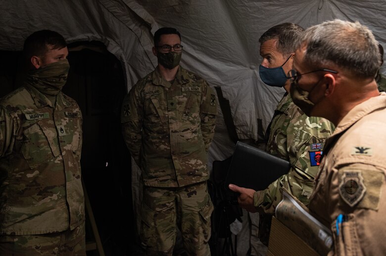 Royal Air Force Air Commodore Phil Robinson, Director of the Combined Air Operations Center, toured Prince Sultan Air Base, Kingdom of Saudi Arabia, Jan. 19, 2021.