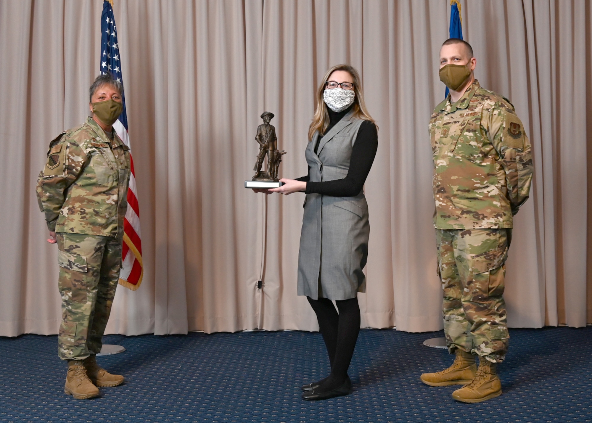 Col. Katrina Stephens, 66th Air Base Group commander, and Chief Master Sgt. Bill Hebb, 66 ABG command chief, Rachel C. D’Orazio, 66th Air Base Group Staff Judge Advocate, with the 2020 Civilian Category 3 of the Year at Hanscom Air Force Base, Mass., Jan 20.