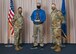 Col. Katrina Stephens, 66th Air Base Group commander, and Chief Master Sgt. Bill Hebb, 66 ABG command chief, present Scott E. Sheehan, 66th Civil Engineer Division, with the 2020 Civilian Category 2 of the Year award at Hanscom Air Force Base, Mass., Jan 20.
