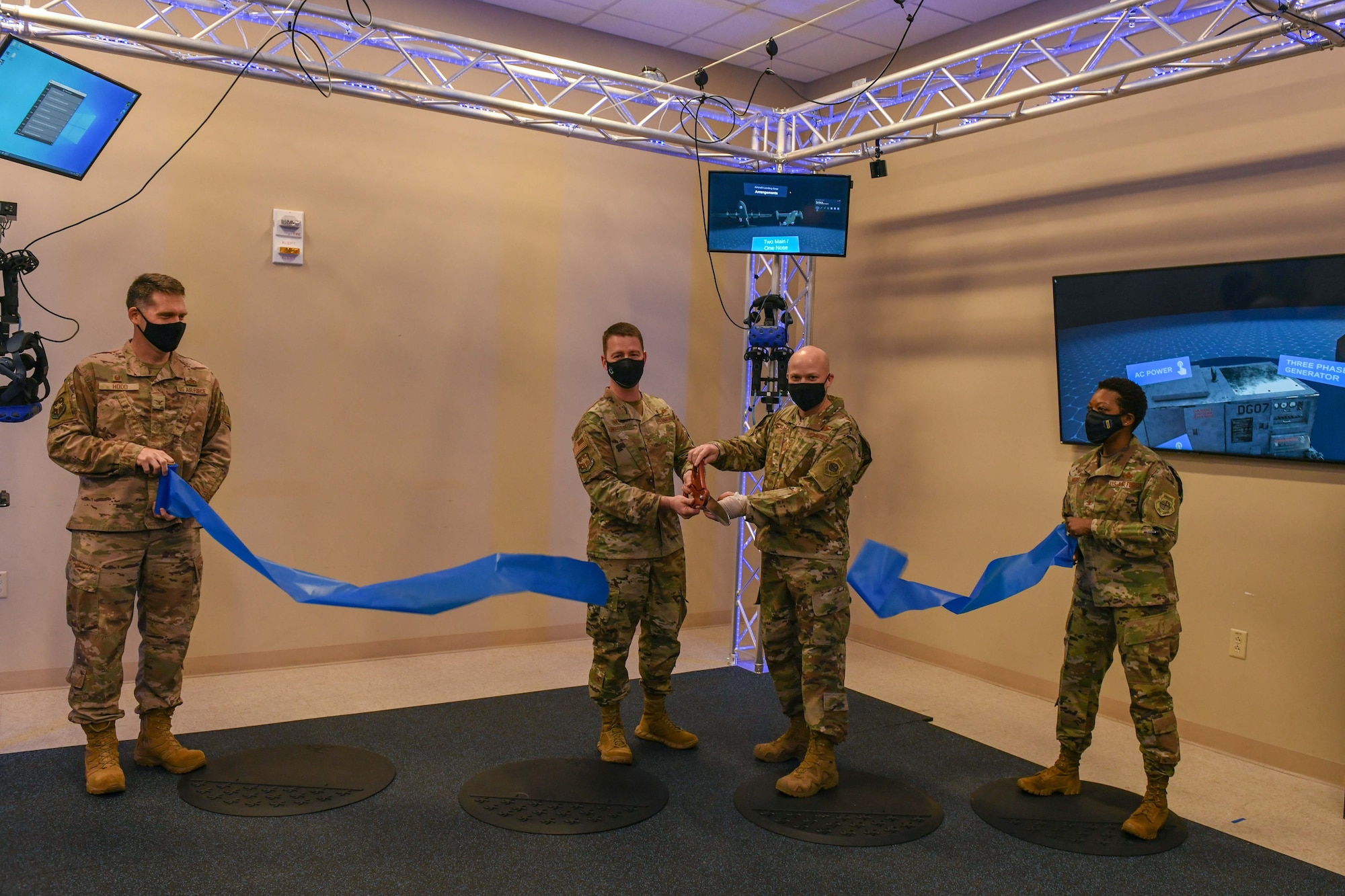 A grand-opening ribbon is cut