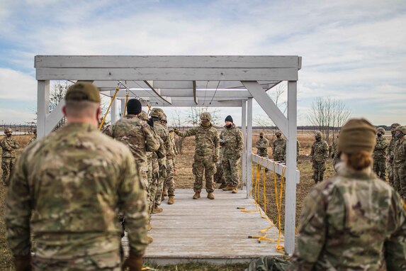 U.S. Army Reserve Paratroopers with the 404th Civil Affairs Battalion and the 450th Civil Affairs Battalion, U.S. Army Civil Affairs & Psychological Operations Command (Airborne), prepare to conduct airborne operations at Joint Base McGuire-Dix-Lakehurst, N.J., Jan. 8, 2021. The units conducted non-tactical airborne operations in order to maintain mission readiness and proficiency among their paratroopers.
