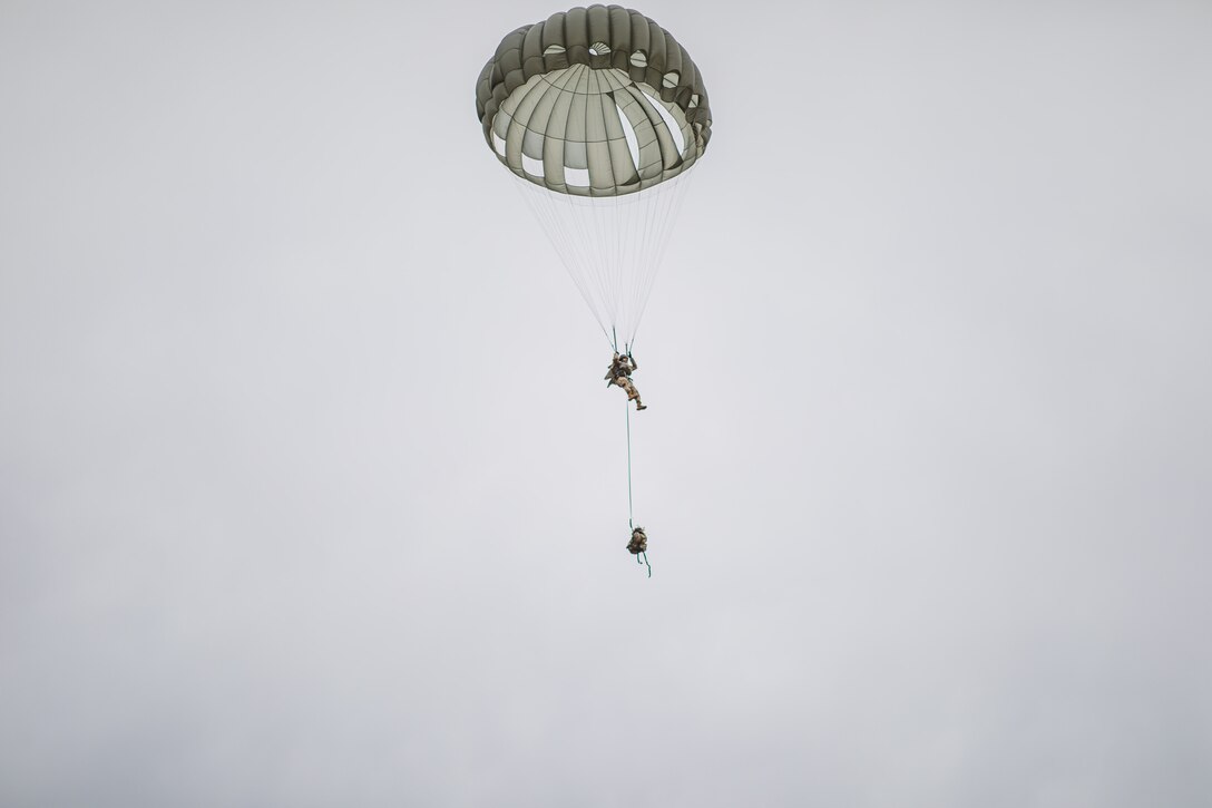 A U.S. Army Reserve Paratrooper navigates the winds during an airborne operation conducted by the 404th Civil Affairs Battalion and the 450th Civil Affairs Battalion, U.S. Army Civil Affairs & Psychological Operations Command (Airborne) at Joint Base McGuire-Dix-Lakehurst, N.J., Jan. 8, 2021. The unit conducted non-tactical airborne operations in order to maintain mission readiness and proficiency among their paratroopers.