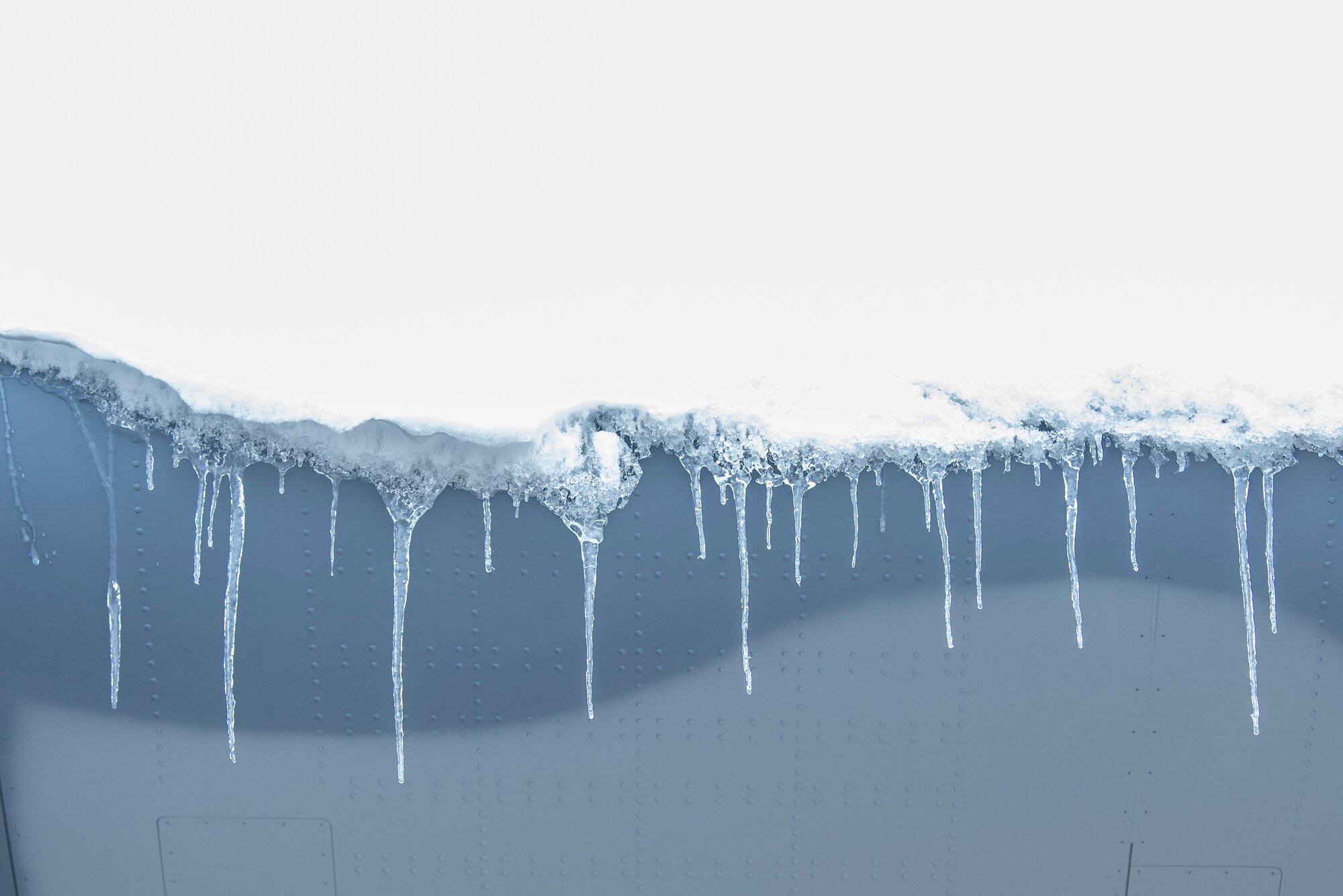 Icicles hang from the wing of an AC-130 Whiskey