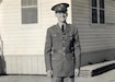 Soldier standing in front of building