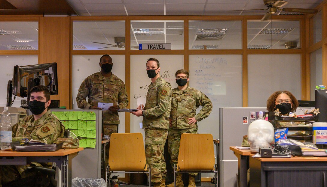 A photo of Airmen posing for a photo.