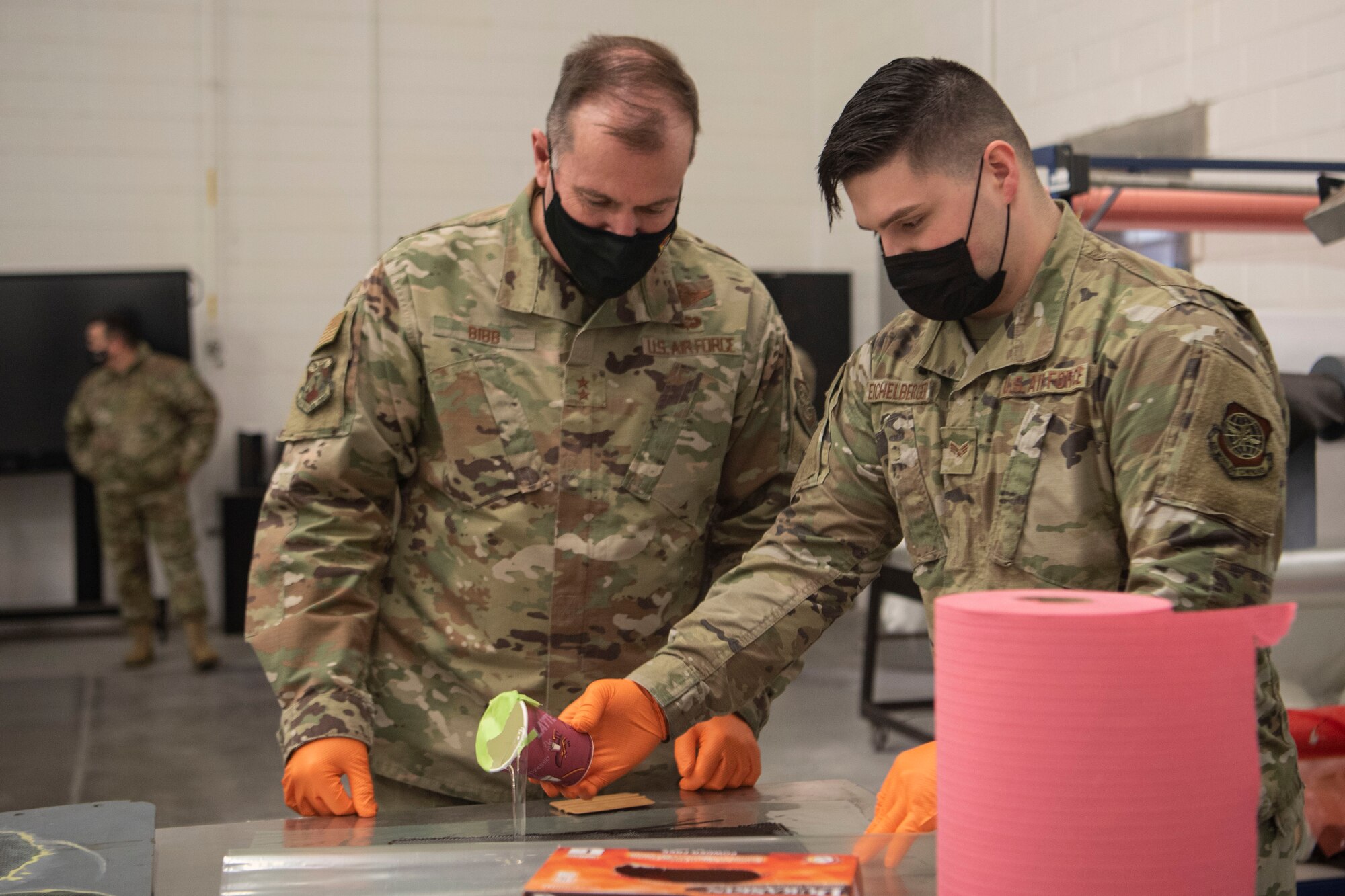 Photo of Airmen preforming a demonstration.