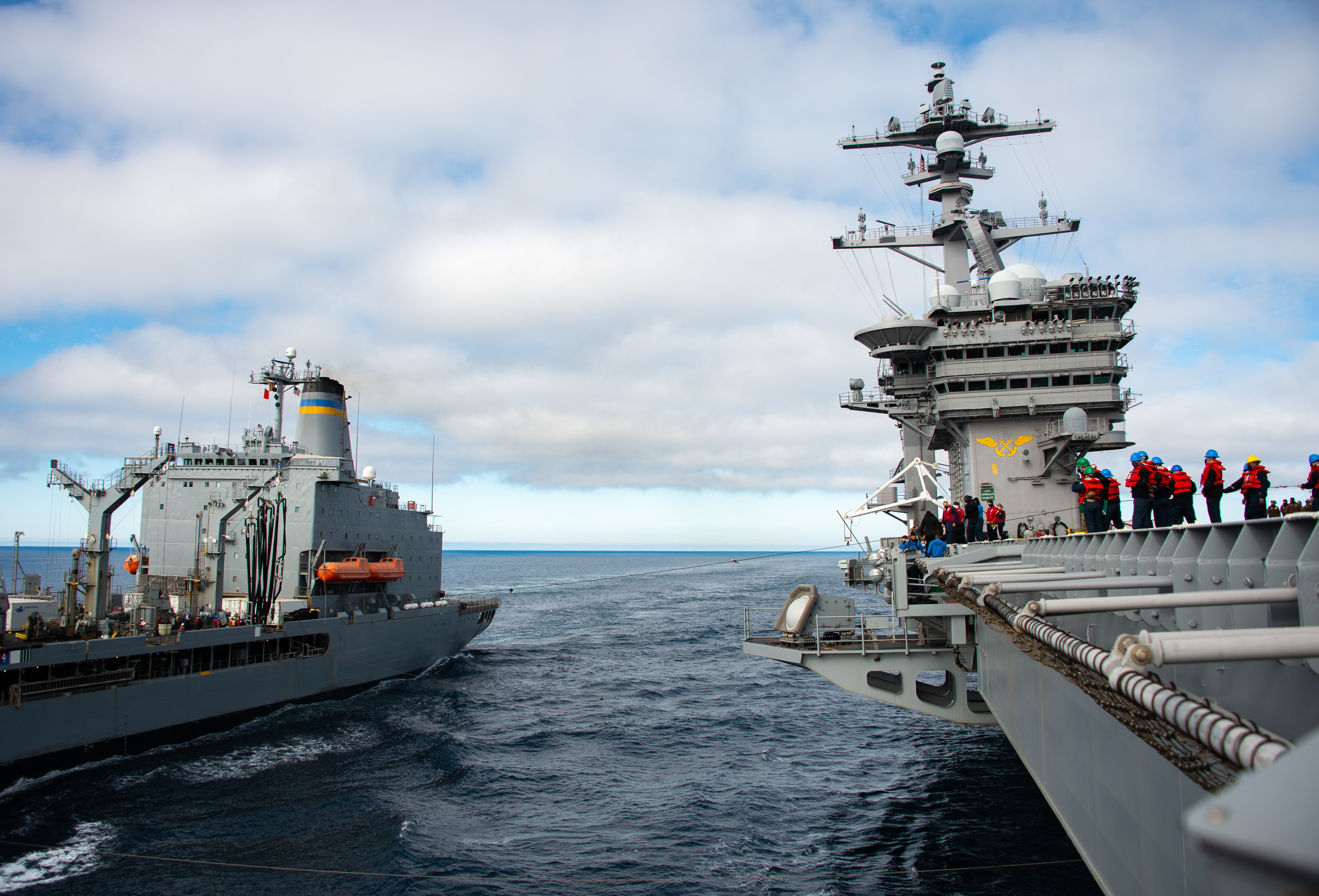 Nimitz-class aircraft carrier USS Carl Vinson (CVN 70) conducts a replenishment-at-sea with Henry J. Kaiser-class fleet replenishment oiler USNS John Lenthall (T-AO 189).
