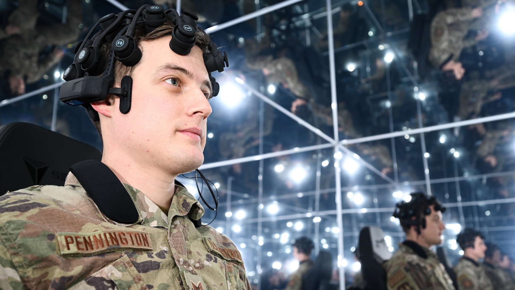 Staff Sgt. Zach Pennington, 775th Explosive Ordnance Disposal Flight, wears an eletroencephalogram helmet during a mindset training session inside an Infinity Cube at Hill Air Force Base, Utah, Jan. 22, 2021. The cube was installed at Hill for user feedback and prototype enhancement as part of an AFWERX Small Business Innovation Research program. (U.S. Air Force photo by R. Nial Bradshaw)