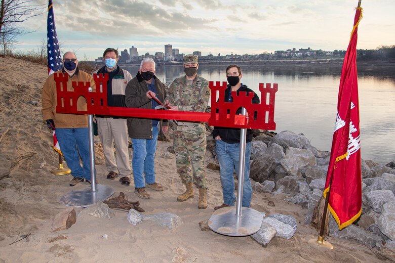 IN THE PHOTO, Project Delivery Team members and Memphis District Commander Col. Zachary Miller cut the ribbon at the Hopefield construction site, symbolizing the victory and celebration of completing yet another significant project. (USACE photo by Vance Harris)