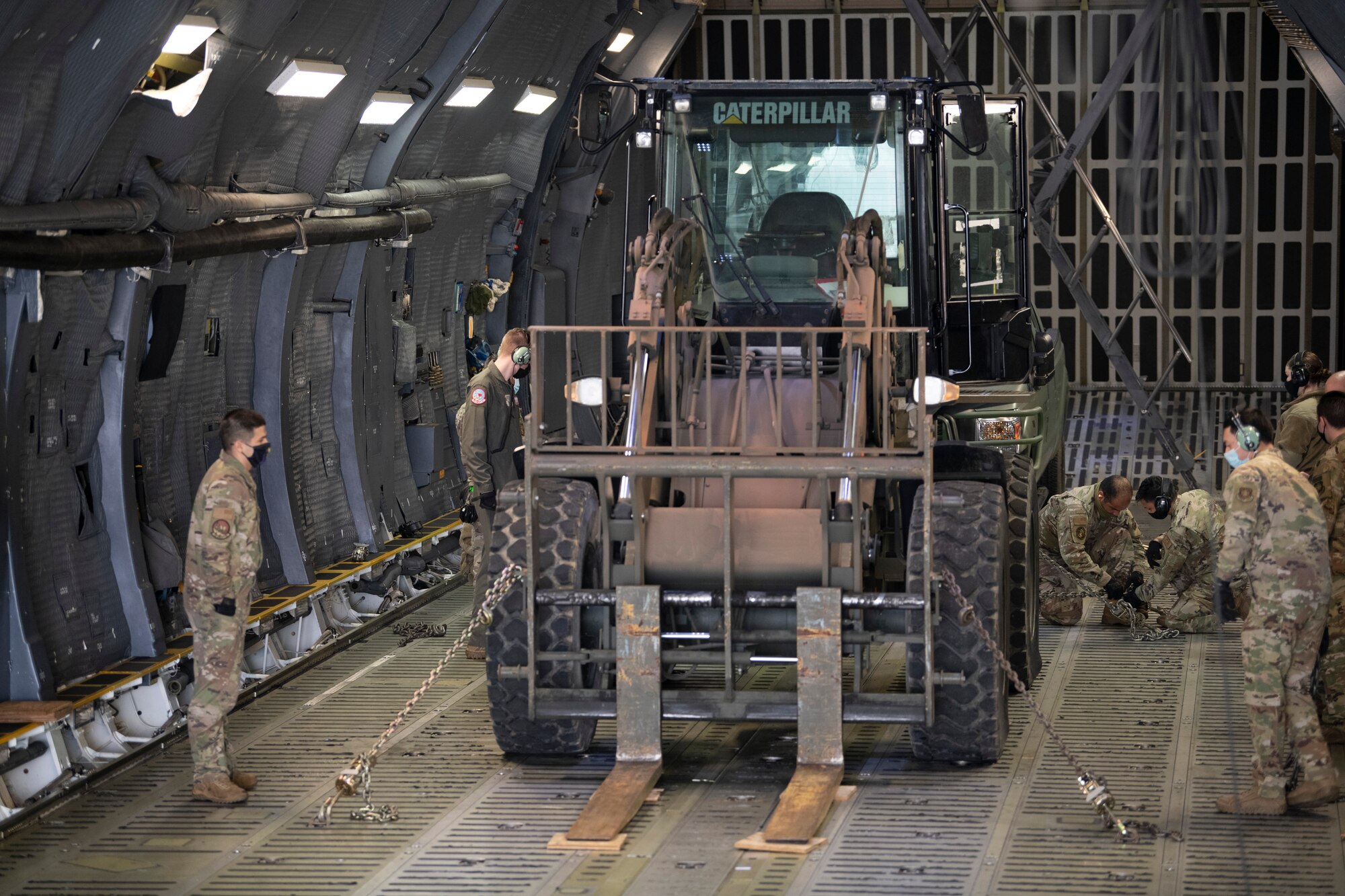 Airmen training on a static C-5