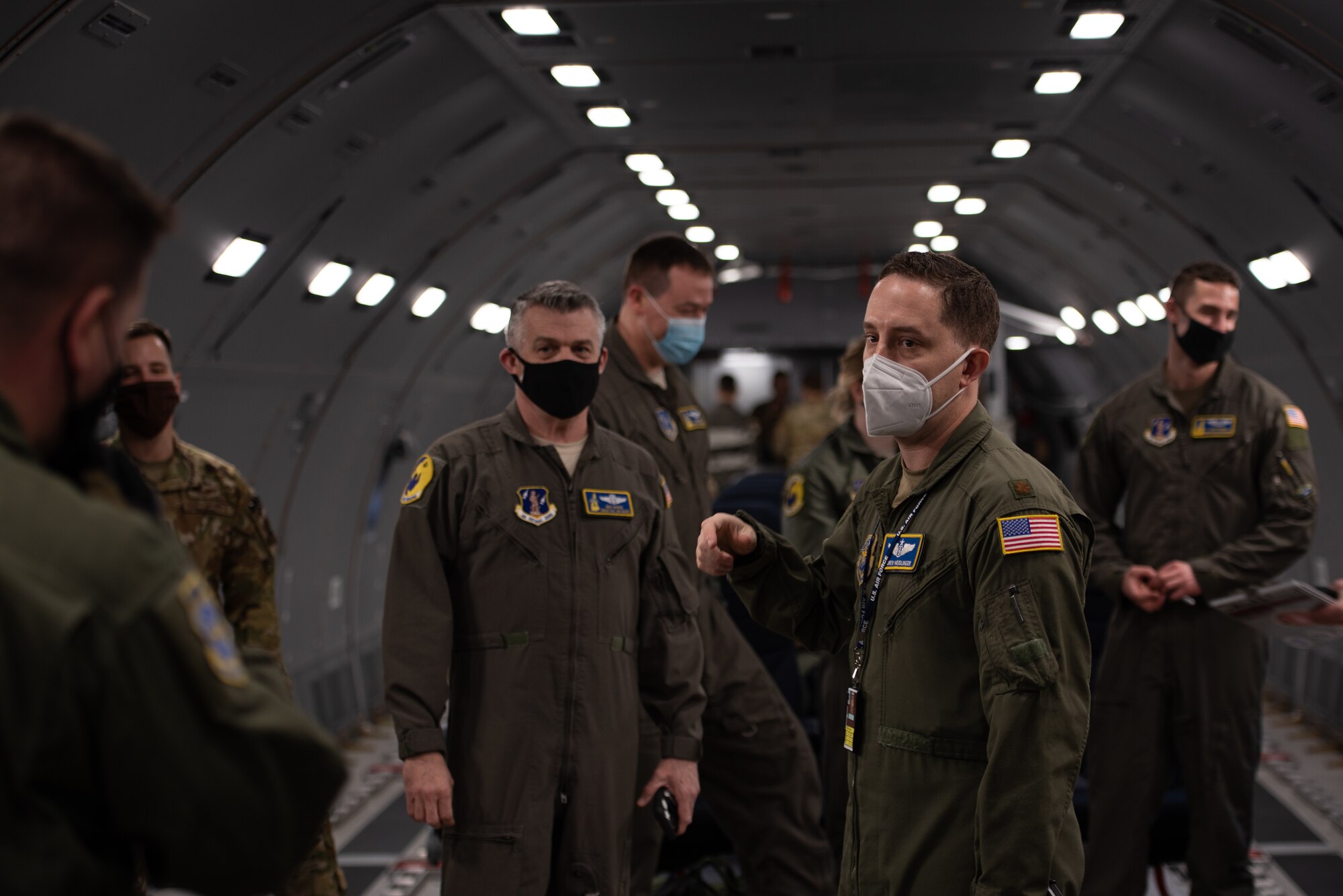 Airmen talking inside KC-46 Pegasus