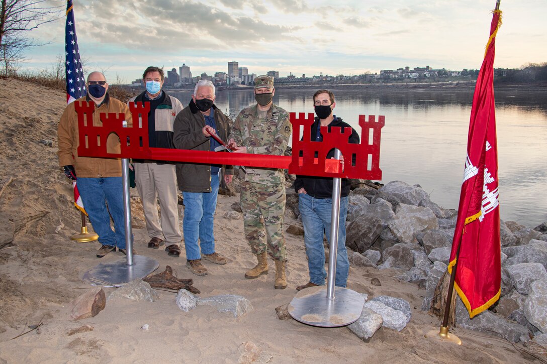 IN THE PHOTO, Project Delivery Team members and Memphis District Commander Col. Zachary Miller cut the ribbon at the Hopefield construction site, symbolizing the victory and celebration of completing yet another significant project. (USACE photo by Vance Harris)