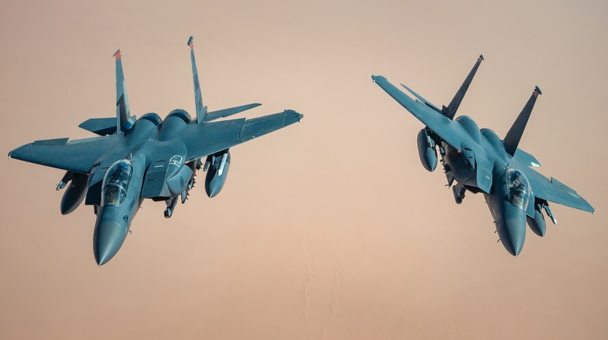 KC-135 provides fuel to F-15s