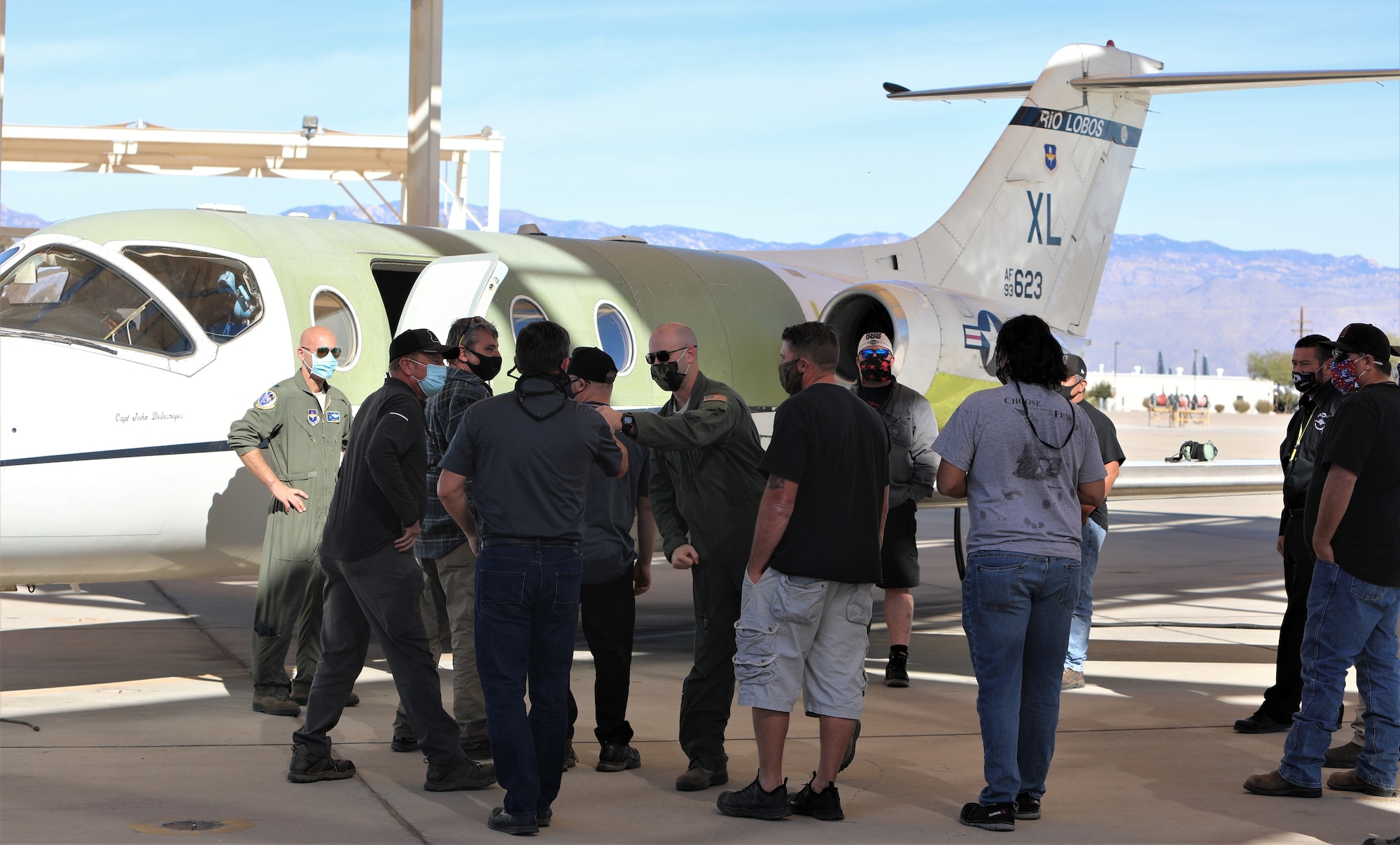 The T-1A Jayhawk maintenance team at the 309th Aerospace Maintenance and Regeneration Group at Davis-Monthan Air Force Base, Ariz., bids farewell to the flight crew.