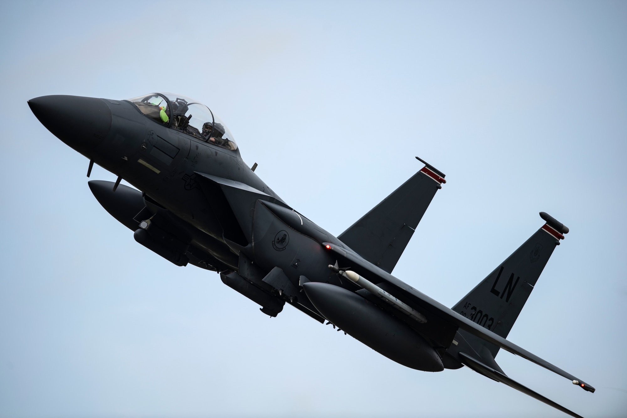 U.S. Air Force Capt. Andrew Munoz, former 494th Fighter Squadron F-15E Strike Eagle pilot and now 335th Fighter Squadron chief of plans, flies overhead with Scoff the Duck after returning from his final flight at Royal Air Force Lakenheath, England, Oct. 28, 2020. Many pilots have  flown with special mementos and gifts from loved ones, which serve as a mental boost of assurance, or a little piece of home when they are away. (U.S. Air Force photo by Airman 1st Class Jessi Monte)