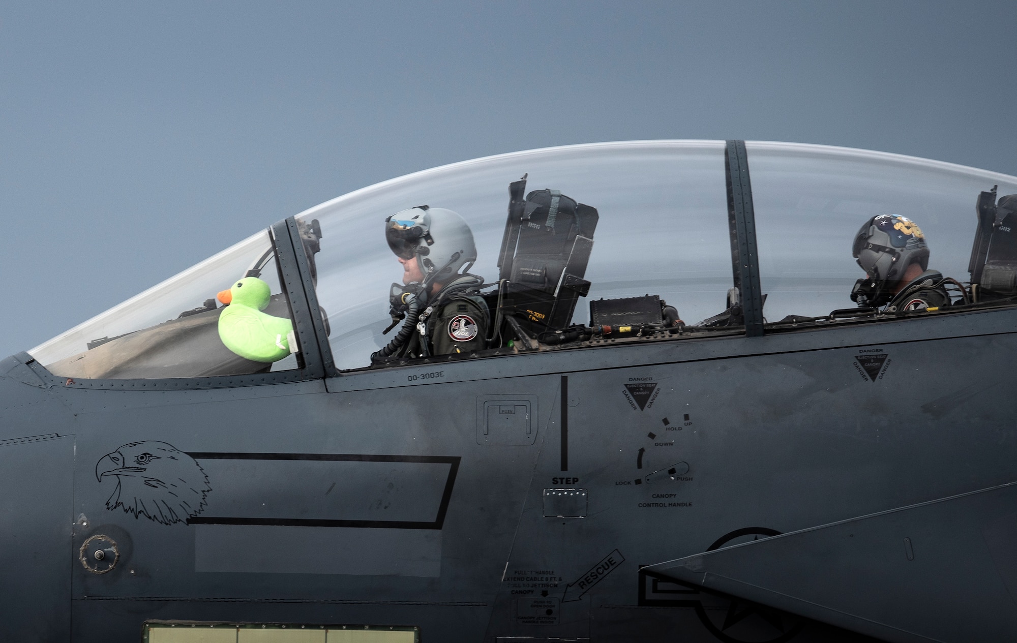 U.S. Air Force Capt. Andrew Munoz, former 494th Fighter Squadron F-15E Strike Eagle pilot and now 335th Fighter Squadron chief of plans, taxis down the runway with Scoff the Duck after returning from his final flight at Royal Air Force Lakenheath, England, Oct. 28, 2020. Many pilots have  flown with special mementos and gifts from loved ones, which serve as a mental boost of assurance, or a little piece of home when they are away. (U.S. Air Force photo by Airman 1st Class Jessi Monte)