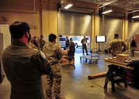 210122-N-PC620-0016 JOINT BASE LANGLEY-EUSTIS, Va. (Jan. 22, 2021) Navy Cmdr. Jonathan Albano, assigned to Joint Task Force Civil Support (JTF-CS), gives a convoy brief to JTF-CS Incident Response Team members prior to departing JTF-CS headquarters for a local hotel to conduct simulated emergency response operations as part of Exercise Sudden Response 21.
