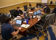 210123-N-PC620-0050 WILLIAMSBURG, Va. (Jan. 23, 2021) Joint Task Force Civil Support Interagency Planning Cell members coordinate simulated mission assignments with the lead federal agency as well as federal, state, and local government as part of simulated emergency response operations during Exercise Sudden Response 21.
