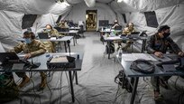 210123-N-PC620-0026 WILLIAMSBURG, Va. (Jan. 23, 2021) Joint Task Force Civil Support Forward Command Element and Incident Support Team members conduct simulated emergency response operations inside a mobile command tent near a local hotel during Exercise Sudden Response 21.