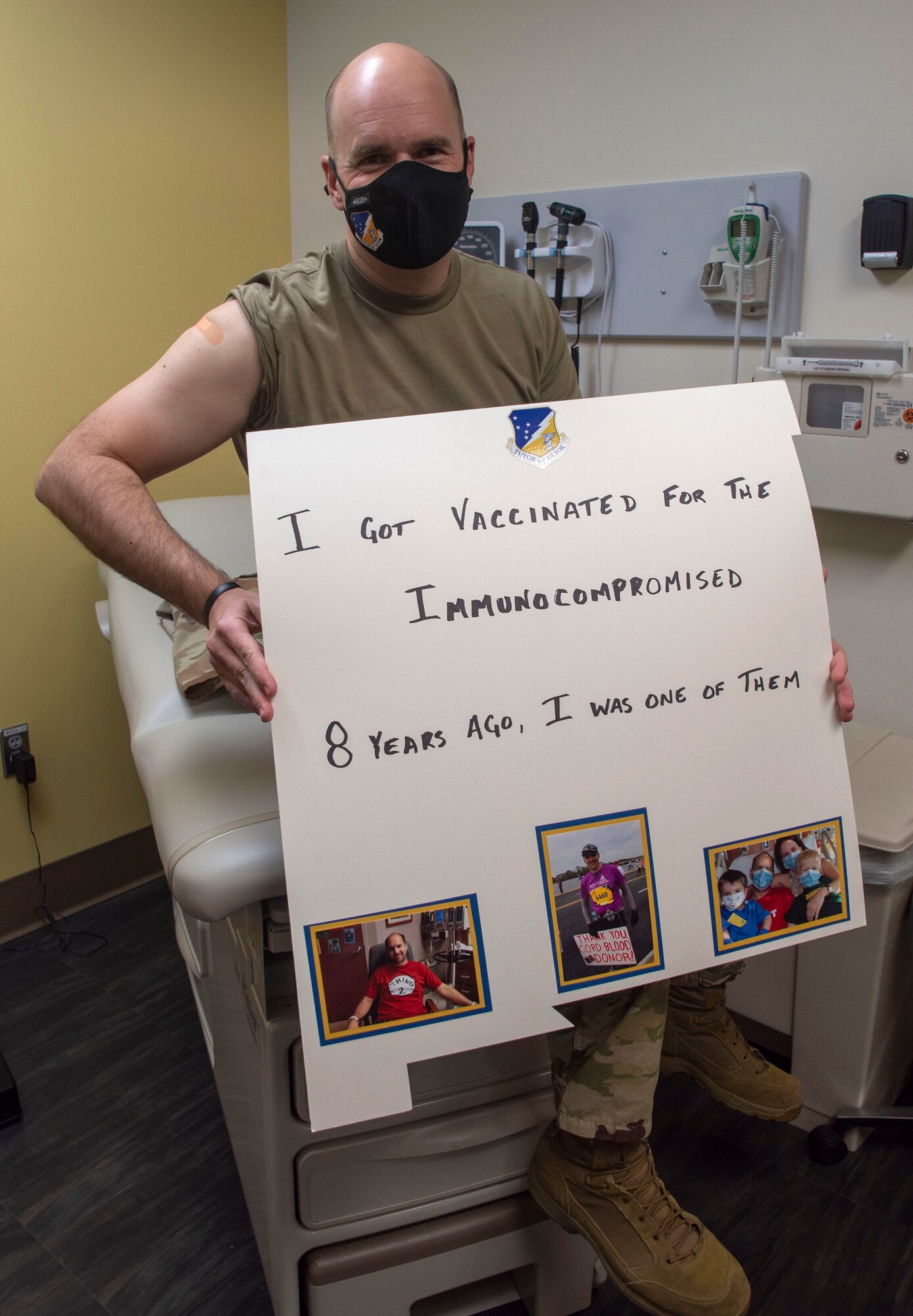 Col. Ryan Keeney, 49th Wing commander, poses for a photo after receiving his COVID-19 vaccine, Jan. 15, 2021, on Holloman Air Force Base, New Mexico. Vaccinations were distributed in phases of prioritization for service members, Department of Defense civilians and families across the DoD. (U.S. Air Force photo by Staff Sgt. Christine Groening)